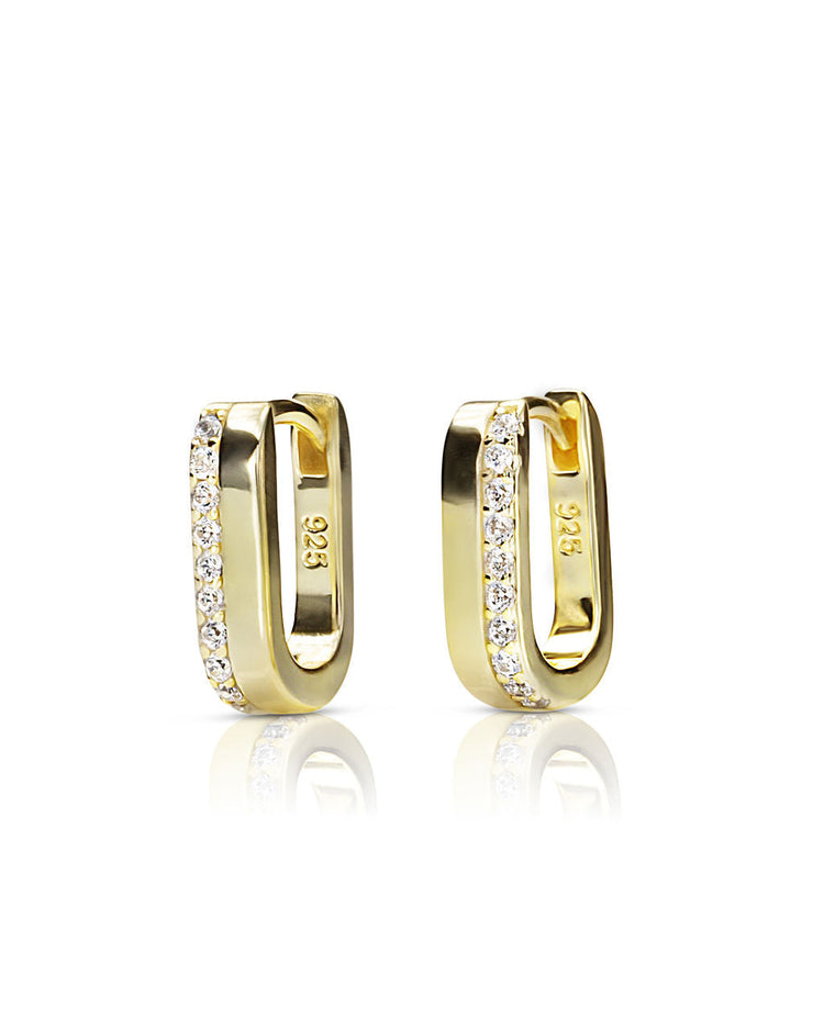 Gold hoop earrings with embedded diamonds on a white background